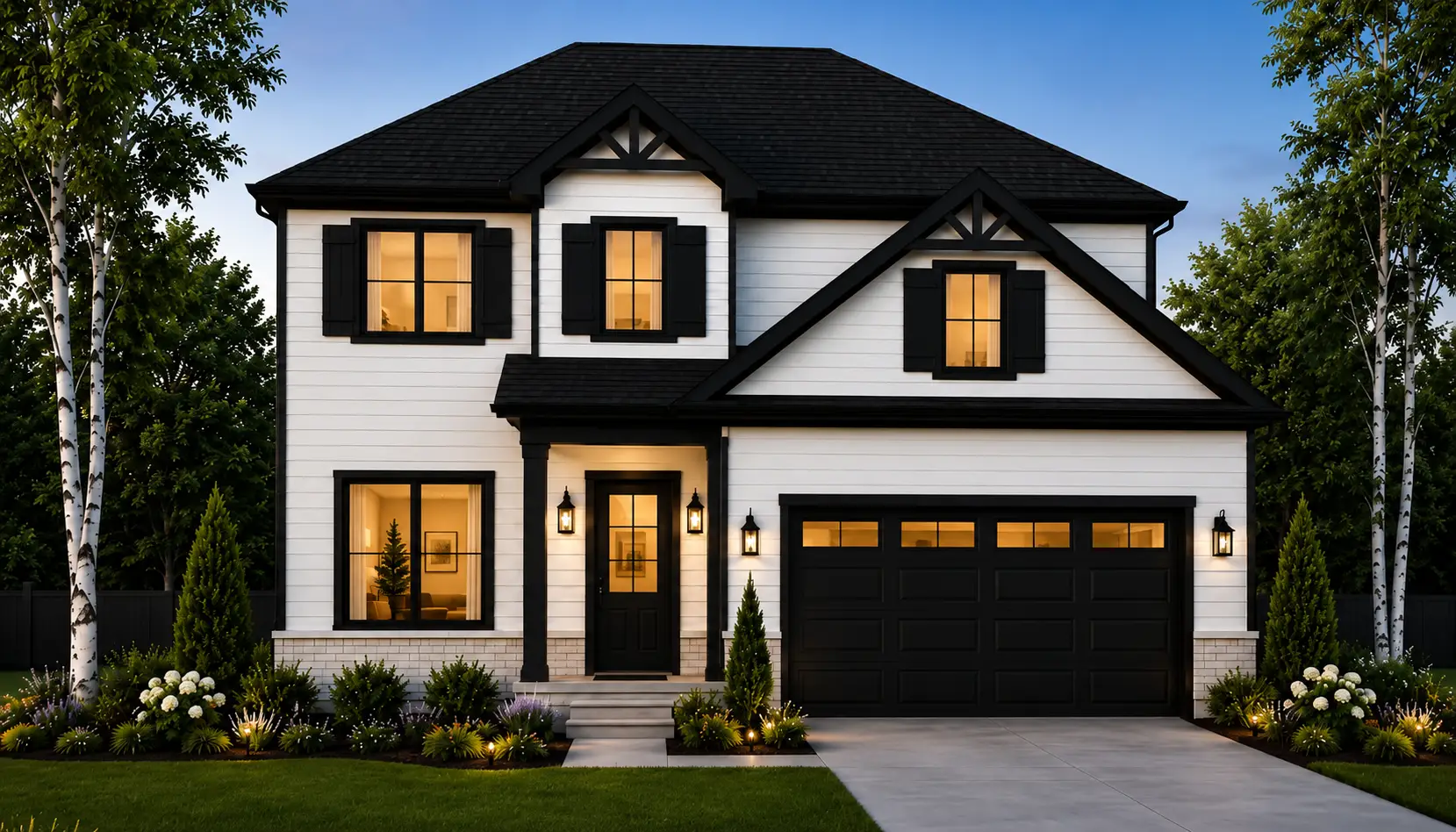 Two-story Henry house with white siding, black trim, and black roof. Warm lights glow from the windows. There’s a double garage, tidy landscaping, and a green lawn. Trees frame the home against a clear blue sky at dusk