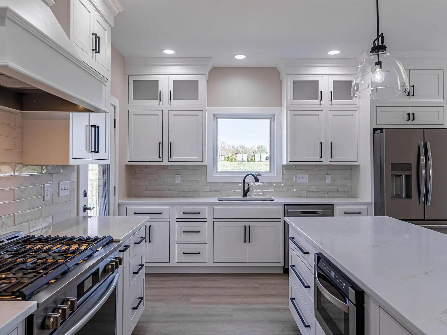 Modern kitchen by Chris Brown Homes 18739 Roscommon Rd, with DaVinci floor plan and sleek design.