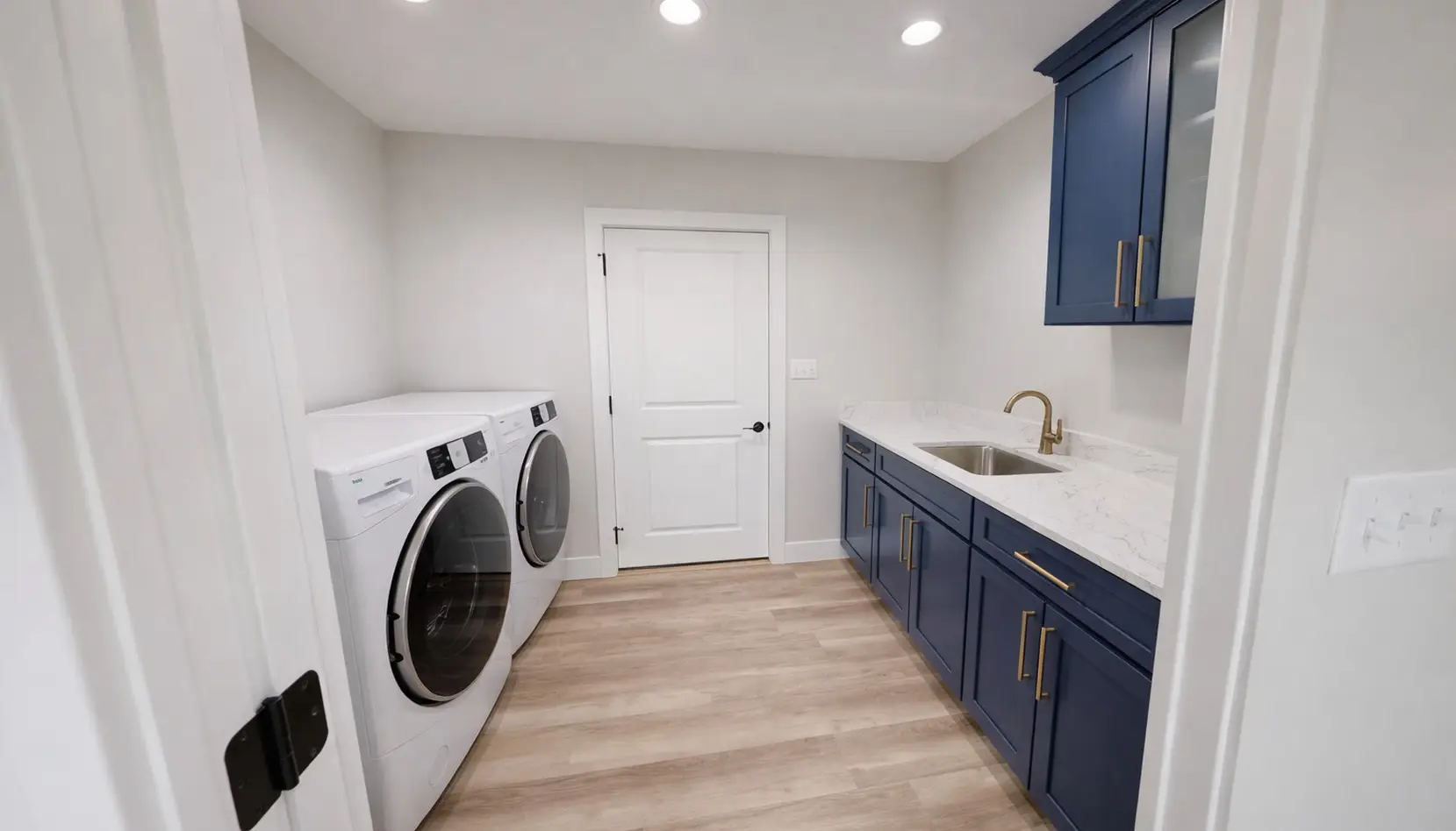 Amy’s Modern Laundry Room With Navy Cabinets