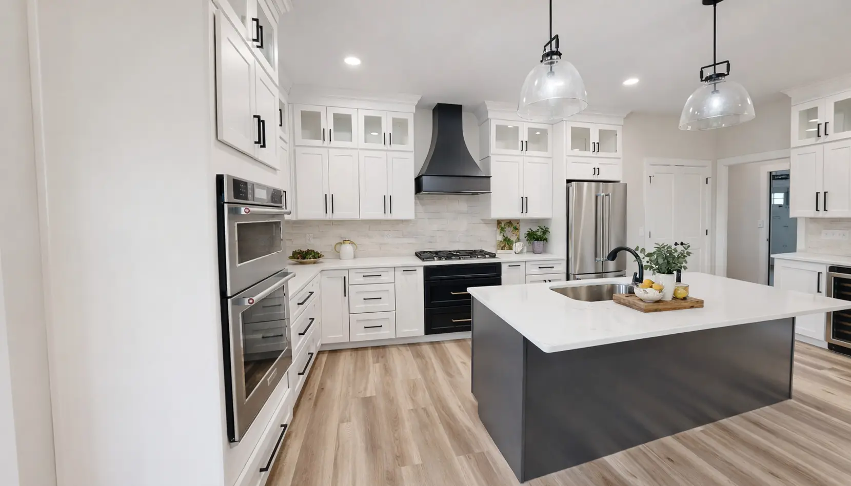 Bright Modern Aurora Kitchen With Island and Black Accents