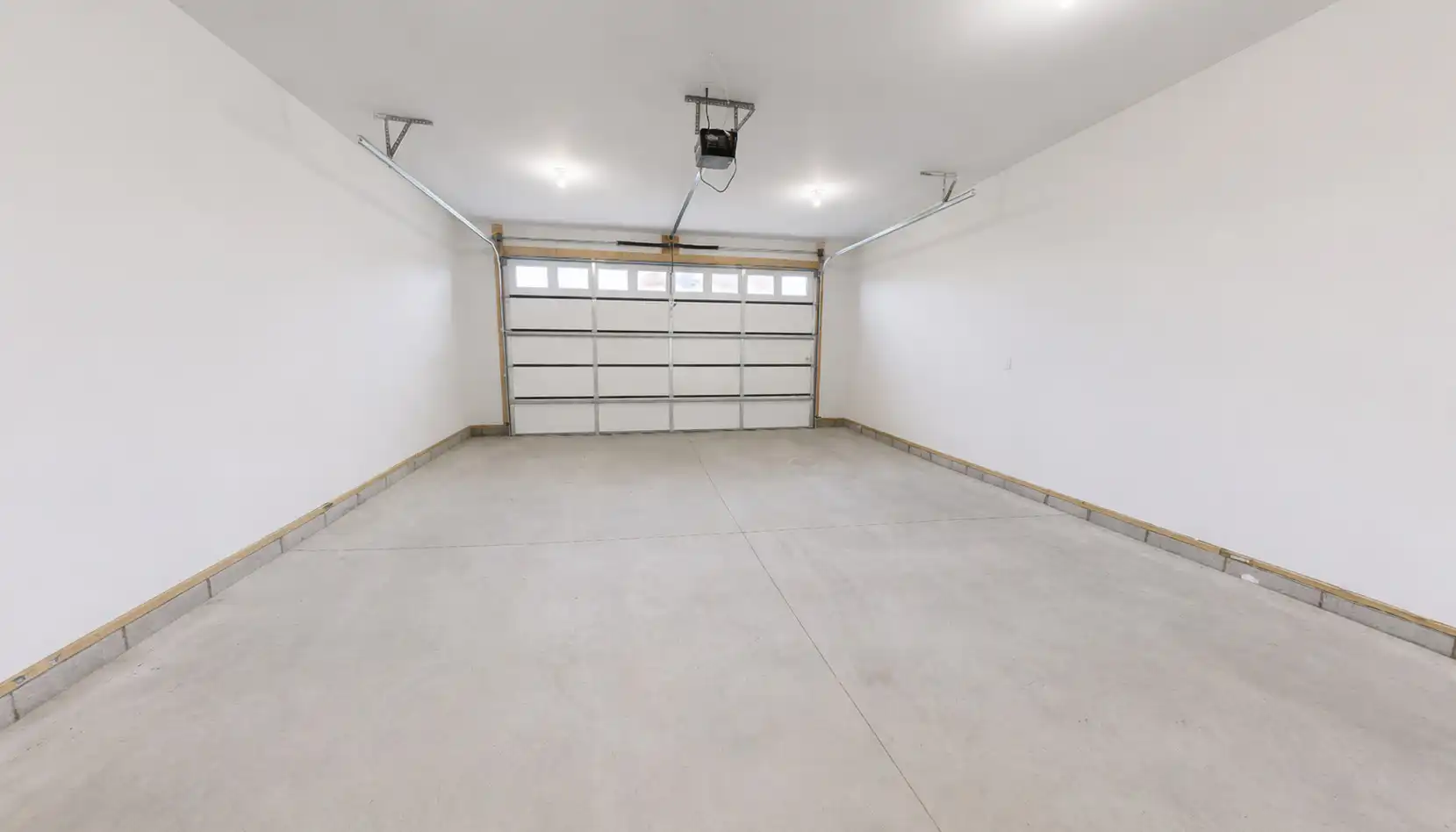 Spacious Empty Eleanor Three-Car Garage Interior