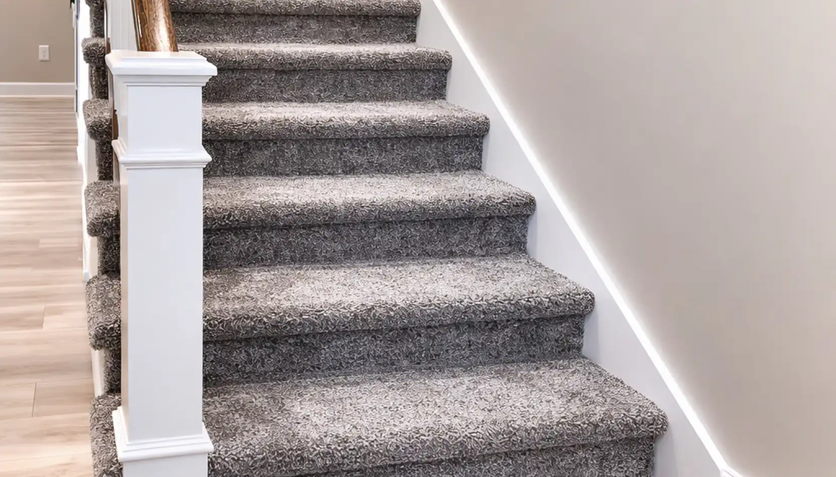 Gray Carpeted Staircase Near Cooper Covered Porch