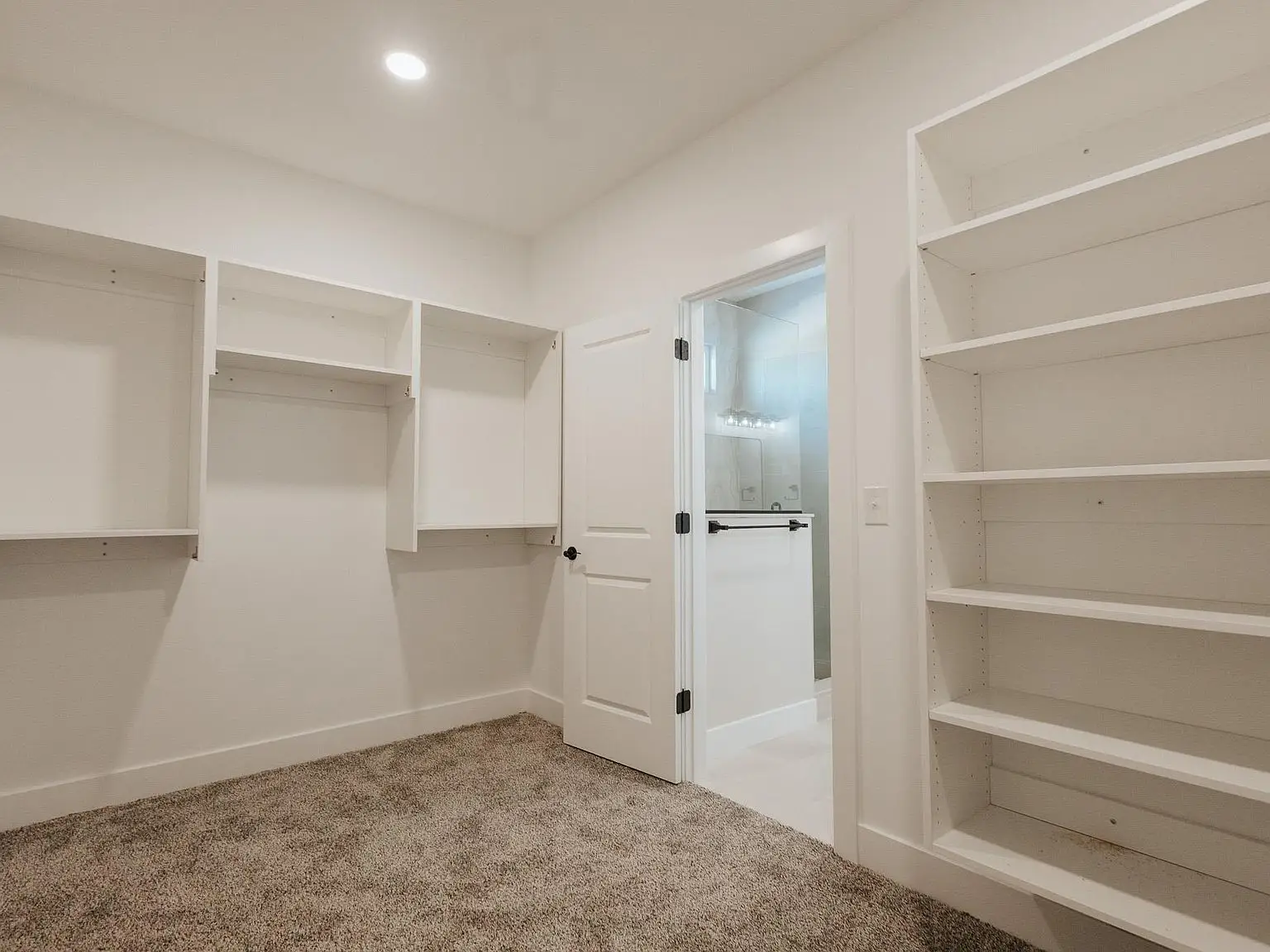 Spacious walk-in closet from the Asher floor plan by Chris Brown Homes, 18801 Roscommon Rd.