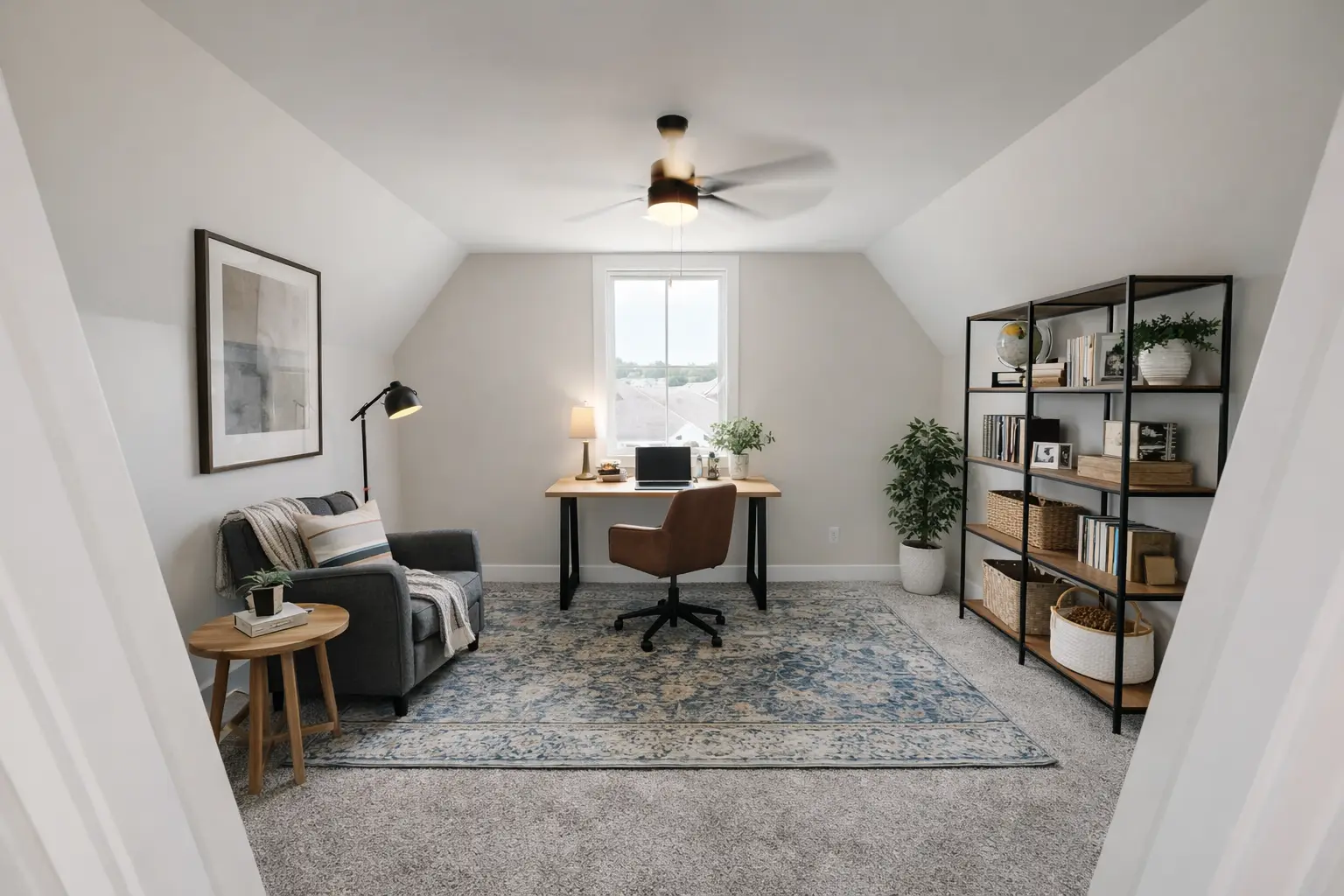 Bright attic home office at 18800 Wicklow Way with desk, reading nook, and bookshelves.