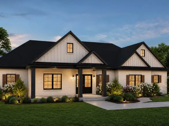 Single-story modern farmhouse with white siding, black roof, large windows, front porch with columns, landscaped garden where a robin perches on a fence post, and a concrete driveway—captured at dusk with lights glowing inside the house.