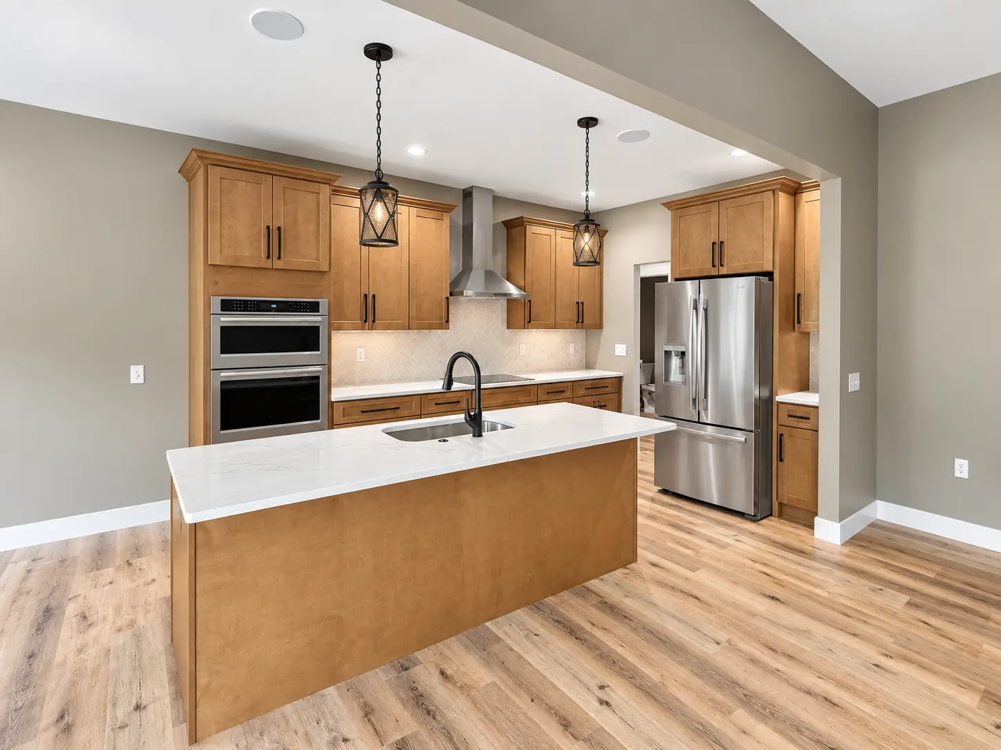 Modern Kirkwood Kitchen With Wood Cabinets and Island