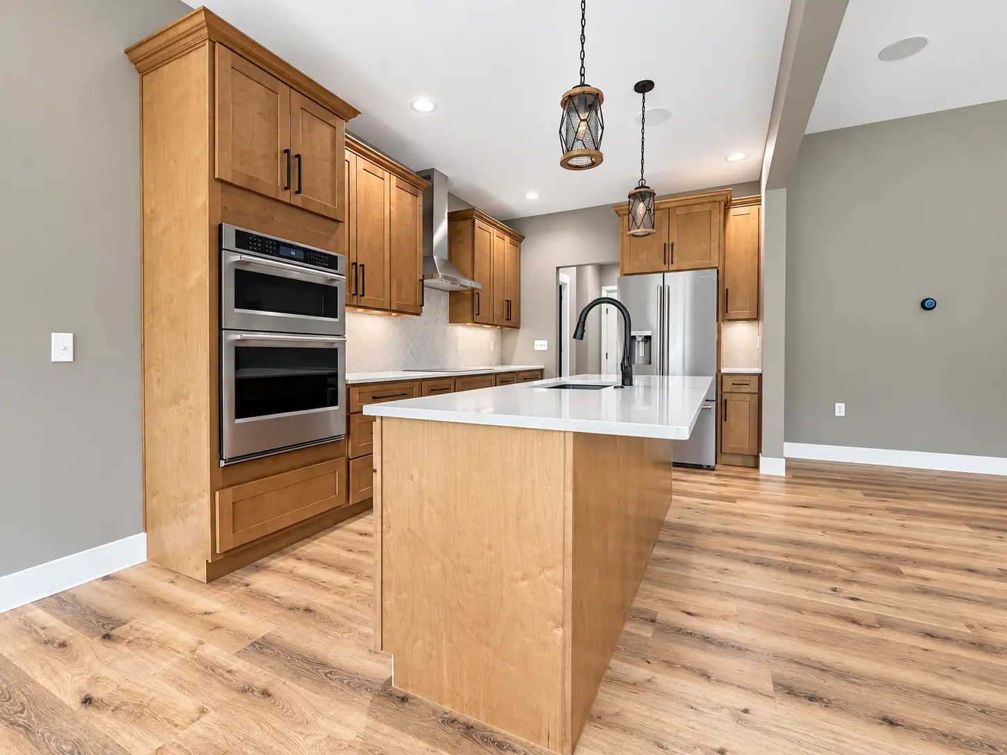 Modern Kirkwood Kitchen With Wood Cabinets and Island