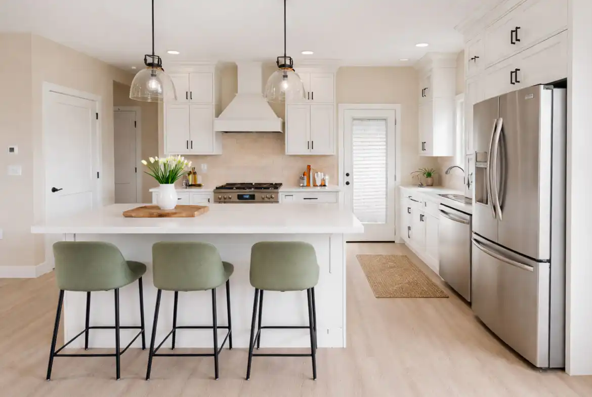 Move-in-ready Asher floor plan kitchen at 5622 Lenox Drive with island and stainless steel appliances.