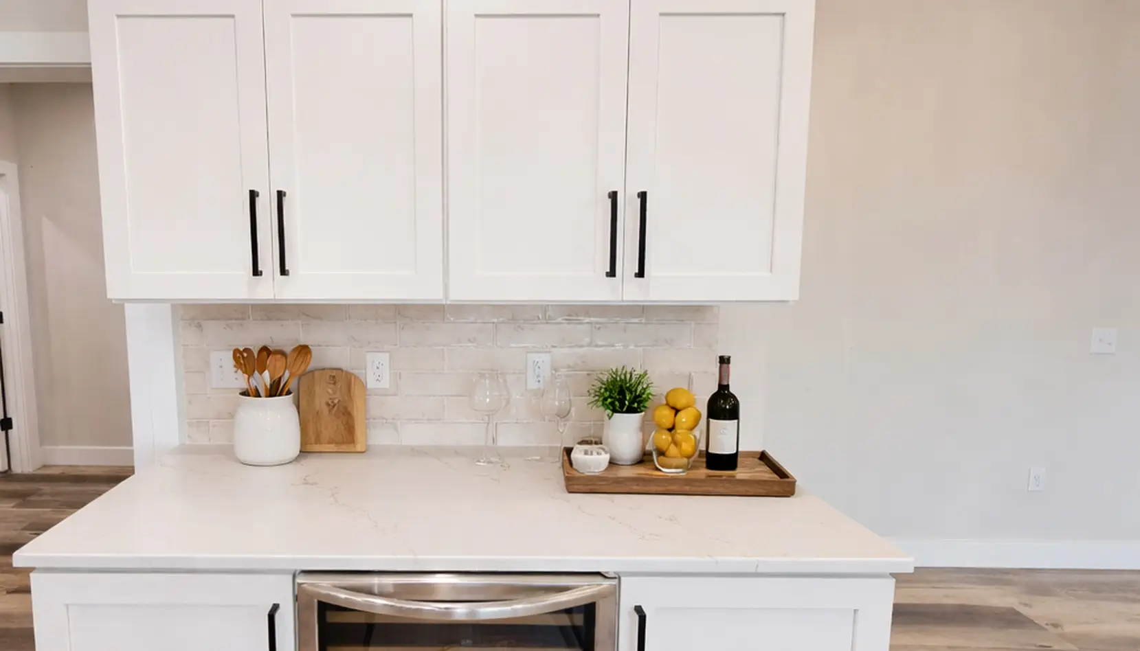 Modern Aurora White Kitchen With Warm Accents